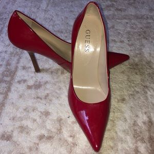 Guess red pointed toe pumps